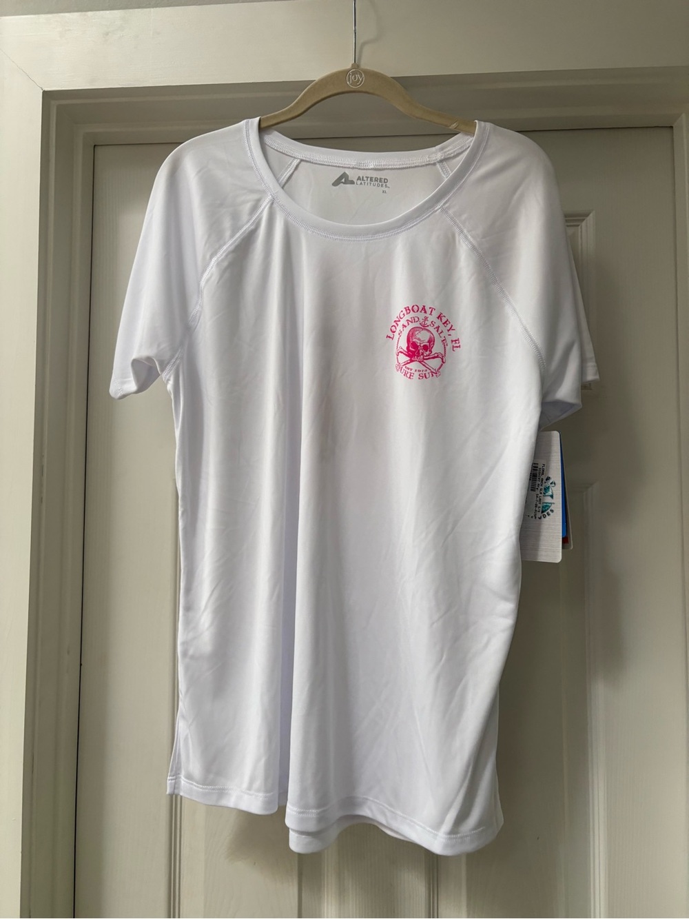 White Short Sleeve Performance Tee with Pink Chest Graphic